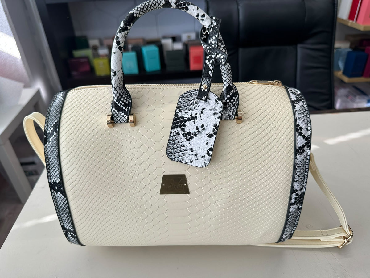 BLOCK36:BAULETTO IN ECOPELLE BIANCO CON DETTAGLI NERI E BIANCHI