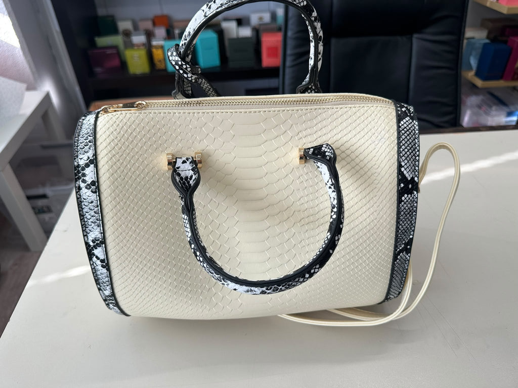 BLOCK36:BAULETTO IN ECOPELLE BIANCO CON DETTAGLI NERI E BIANCHI